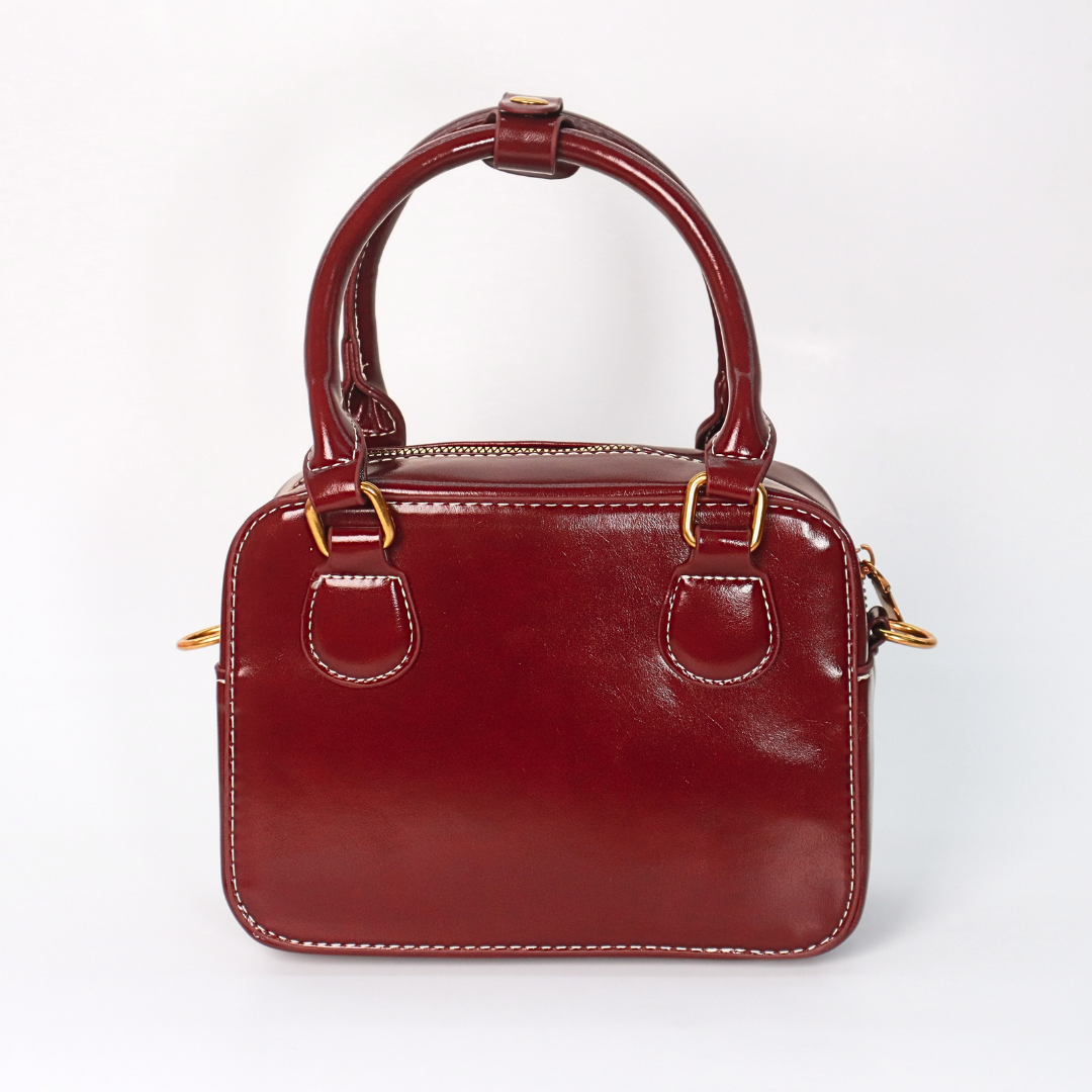 Cartera Kitty Borgoña