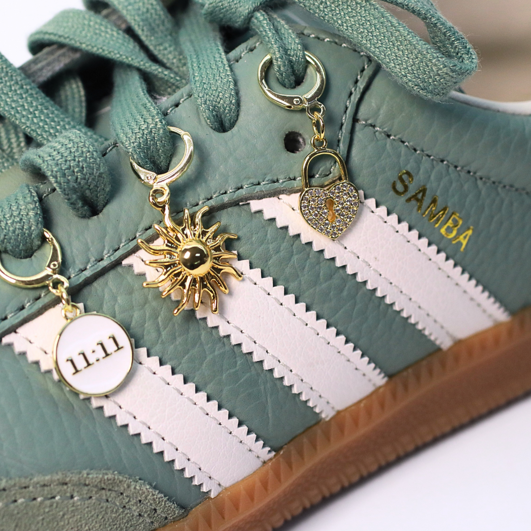 charm en forma de sol